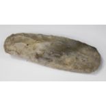 A Danish Neolithic chipped flint axe, indistinctly inscribed 'Denmark', length 25cm.Buyer’s