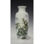 A Chinese porcelain vase, Republic period, the shouldered tapering body painted with a mountainous