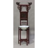 A Chinese red painted carved wood washstand, early 20th century, the back with carved dragon head