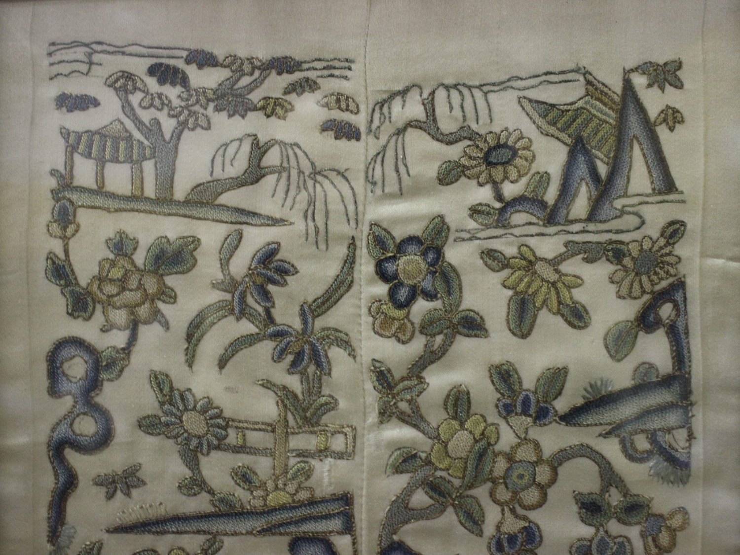 A pair of Chinese silk embroidered sleeve panels, late Qing dynasty, joined as one and worked in - Image 2 of 4