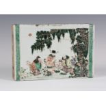 A rare Chinese famille verte porcelain brick form pillow, Kangxi period, one side painted with three