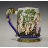 A Capodimonte porcelain tankard, late 19th/20th century, the cylindrical body decorated in high