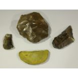 A group of four Egyptian Stone Age chipped flint tools, the largest inscribed 'Egypt Thebes', length