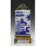 A Chinese blue and white export porcelain vase, Qing dynasty, of square section, the sides painted
