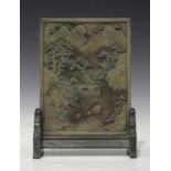 A Chinese inkstone table screen and hardwood stand, 20th century, the rectangular plaque carved in