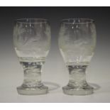 A pair of double-series opaque twist stem goblets, probably early 20th century, one bowl engraved
