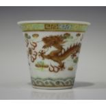A Chinese porcelain wine cup, mark of Guangxu but probably later, the flared body painted with two