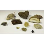 A collection of various mineral specimens, including a banded agate geode section, width 12cm,