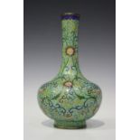 A Chinese cloisonné pale green ground bottle vase, early 20th century, the bulbous body with