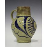 A Wedgwood jug, circa 1868, modelled after a 17th century German saltglaze stein, with incised and