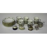 A set of six silver mounted Aynsley bone china cups and saucers, Birmingham 1938 (one cup