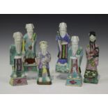 A group of six Chinese famille rose enamelled biscuit porcelain figures of immortals, 18th