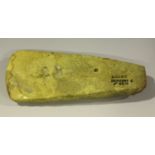 A Danish Neolithic chipped and polished stone axe gouge, with inscribed Hugh Fawcett monogram and
