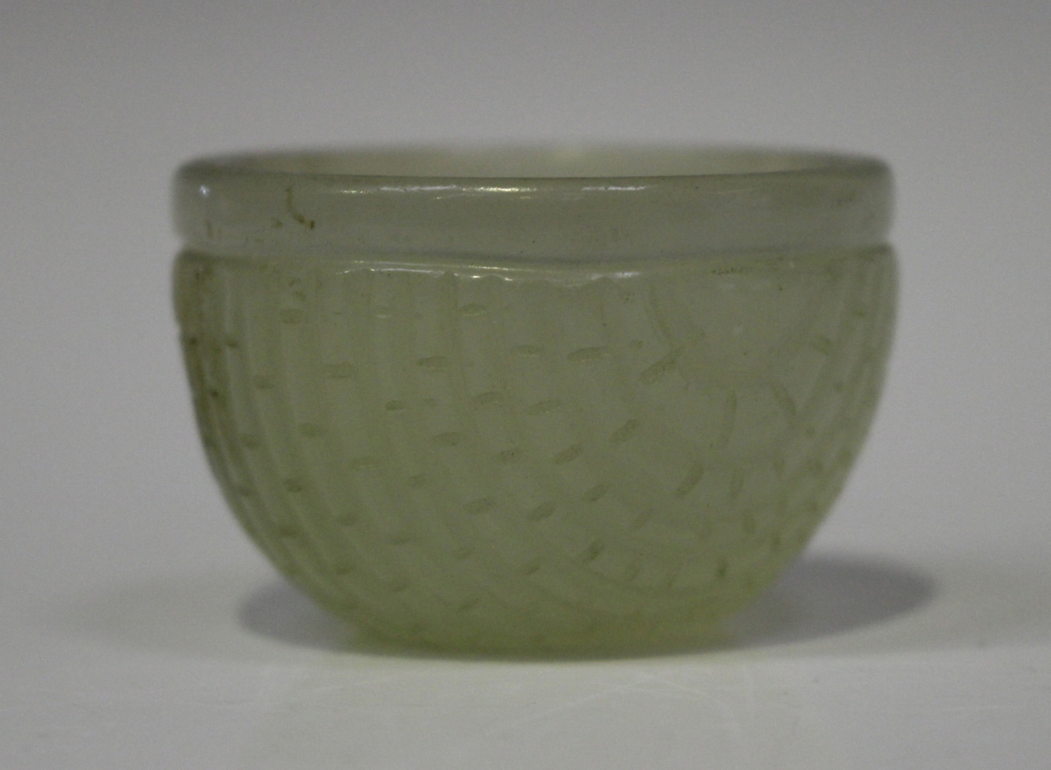 A Chinese small pale celadon jade wine or water cup, Qing dynasty, possibly 18th century, carved - Image 5 of 5