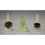 Two Royal Worcester candle snuffers, comprising an owl, circa 1896, height 8cm, and a feathered hat,