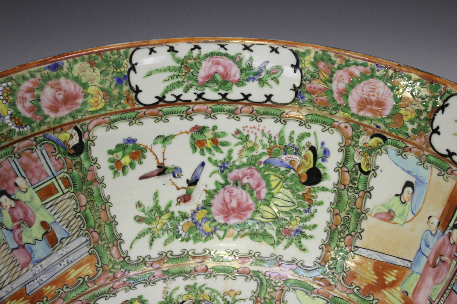 A Chinese Canton famille rose porcelain punchbowl, mid to late 19th century, the interior and - Image 4 of 13