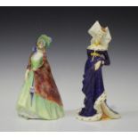 Two Royal Doulton figures, The Lady Anne Nevill, HN2006, and Paisley Shawl, HN1914.Buyer’s Premium