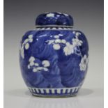 A Chinese blue and white porcelain ginger jar and cover, mark of Kangxi but late 19th century,