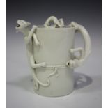 A Chinese blanc-de-Chine porcelain teapot and cover, probably Transitional/Kangxi period, the