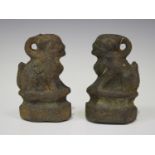 Two Chinese cast iron opium weights, Qing dynasty, each beast modelled on a hexagonal base, height