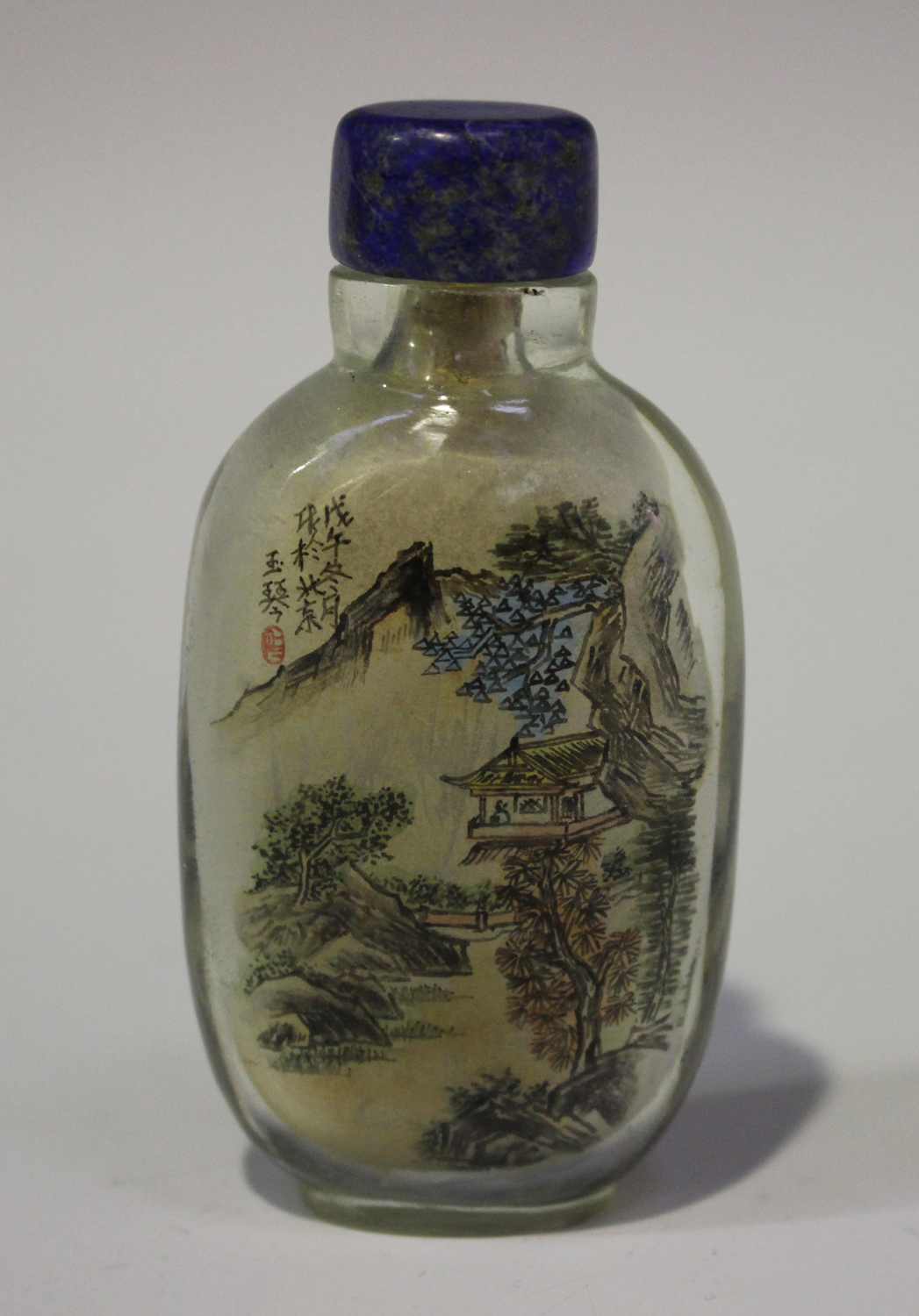 A Chinese inside painted glass snuff bottle, 20th century, of flattened ovoid form, painted with a