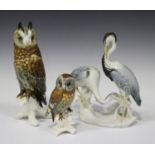 A Karl Ens model of a long-eared owl, height 26cm, a similar smaller Ens owl model, height 15cm, and