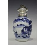 A Chinese blue and white export porcelain tea caddy, Kangxi period, of ovoid form, painted with a