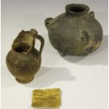 A Romano-British pottery vase, the underside inscribed 'Nr Andover Aug 1867' height 11cm (loss and