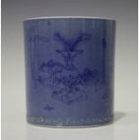 A Chinese blue glazed porcelain brush pot, 18th century style but later, of cylindrical form,