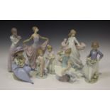 Eight Lladro porcelain figures, including Fragrant Bouquet, No. 5862, Precious Petals, No. 5894,