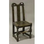 A Queen Anne oak splat back hall chair, the solid seat raised on turned and block legs, height 91cm,