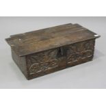 A late 17th century oak bible box, the removable lid above a carved front, both sides inscribed '