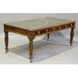 A 19th century mahogany library table, the moulded top inset with a gilt-tooled green leather