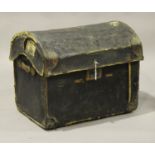 A Victorian black leather domed top travelling trunk, the hinged lid above carrying handles,