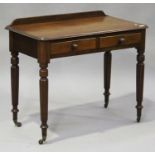 An early Victorian mahogany side table, fitted with two frieze drawers, raised on turned and