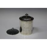 A late Victorian silver tobacco jar and cover with original silver mounted damper, of cylindrical