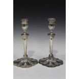 A pair of Elizabeth II silver candlesticks of Neoclassical style on spreading feet, Sheffield 1997