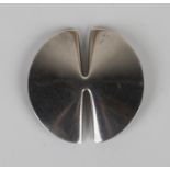 A Georg Jensen sterling brooch in a circular abstract design, designed by Nanna Ditzel, detailed '