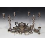 A small group of silver and plated items, including a late Victorian spill vase with scroll