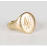 A gold oval signet ring, monogram engraved, detailed '18', ring size approx O1/2.Buyer’s Premium