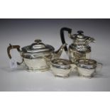 A George VI silver three-piece tea set of octagonal form, comprising teapot, two-handled sugar