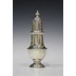 A George V silver sugar caster of baluster form with pierced dome cover, London 1928 by Goldsmiths &