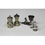 An Edwardian silver pepper mill of baluster form, engraved with foliate scrolls, London 1901 by