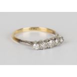 A gold and diamond five stone ring, mounted with a row of circular cut diamonds, detailed '18ct',