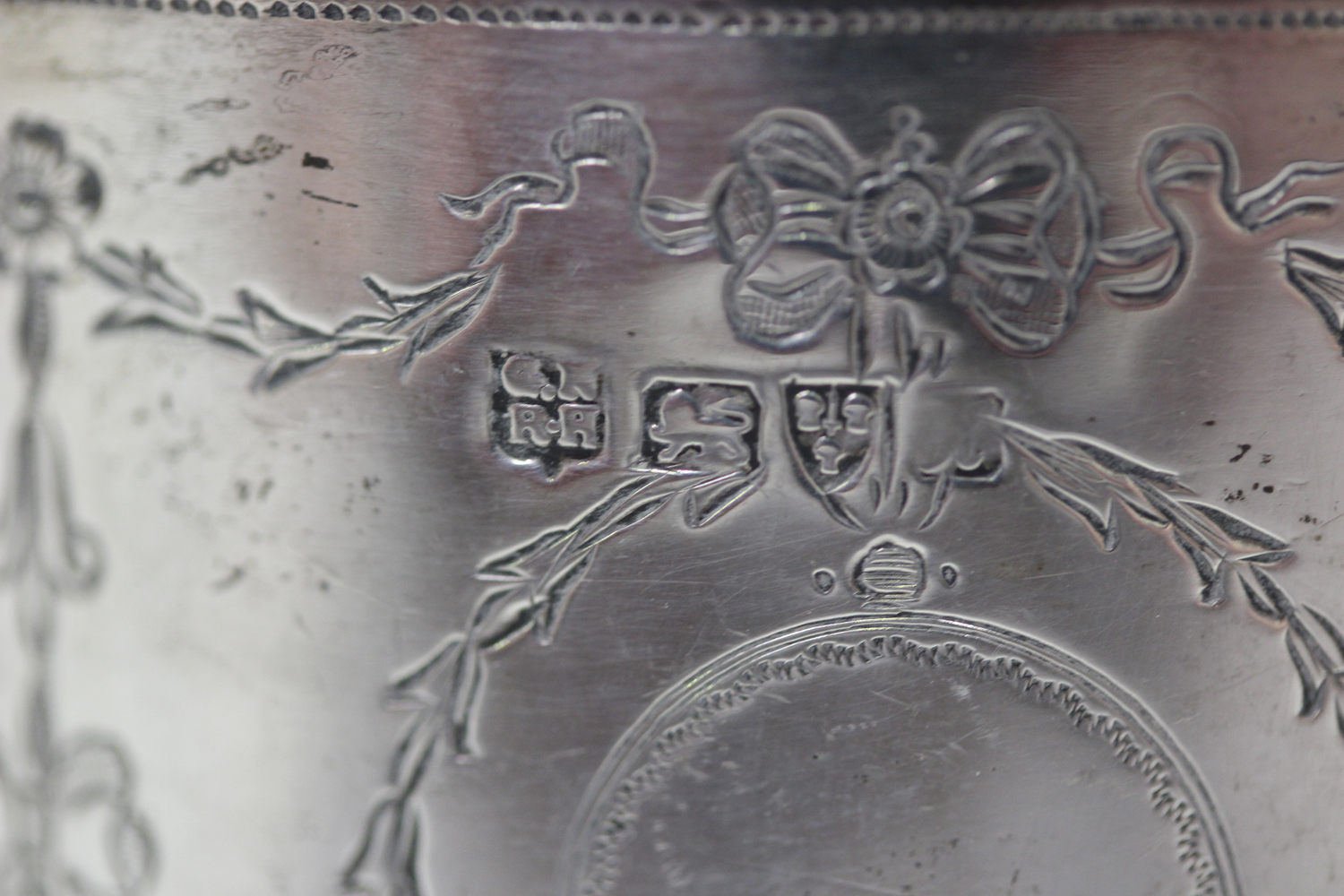 A George V silver oval tea caddy, engraved with opposing bellflower pendant cartouche and bellflower - Image 2 of 2