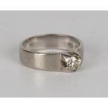 A white gold and diamond single stone ring, mounted with a cushion cut diamond, detailed '750', ring