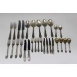 A German .800 silver part canteen of cutlery with beaded decoration, including five tablespoons,