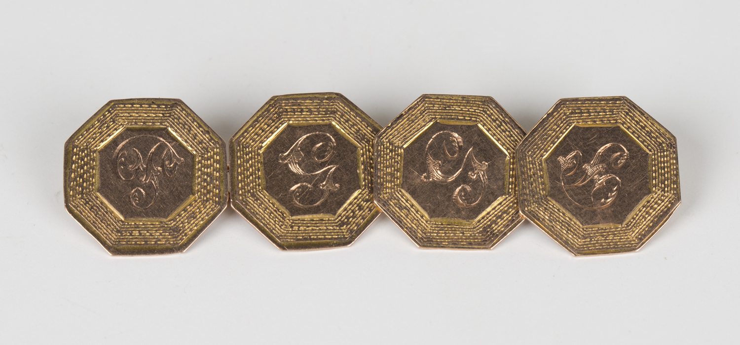 A pair of 9ct gold octagonal cufflinks, initial engraved within engine turned borders, Chester