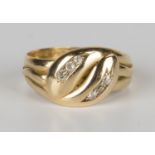 An 18ct gold and diamond ring, designed as a twin headed snake, mounted with two rows of three