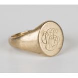 A 9ct gold oval signet ring, monogram engraved, Birmingham 1957, ring size approx R.Buyer’s